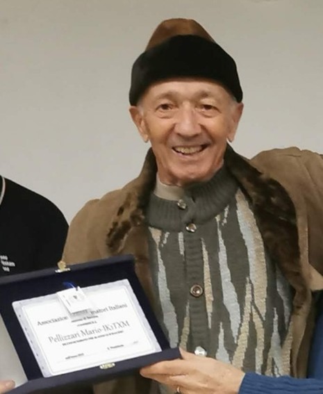 † Mario Pellizzari, IK1TXM